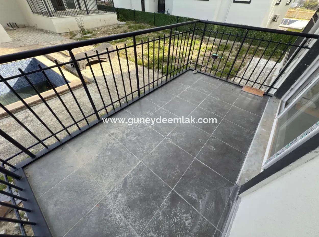 1 1 Spacious Brand New Apartment For Sale In A Complex With Pool Close To The Center Of Ortaca.