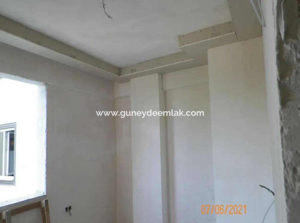 Muğla Ortacada Dalyan Yoluna Cepheli 2+1 Sıfır Daireler Satılık