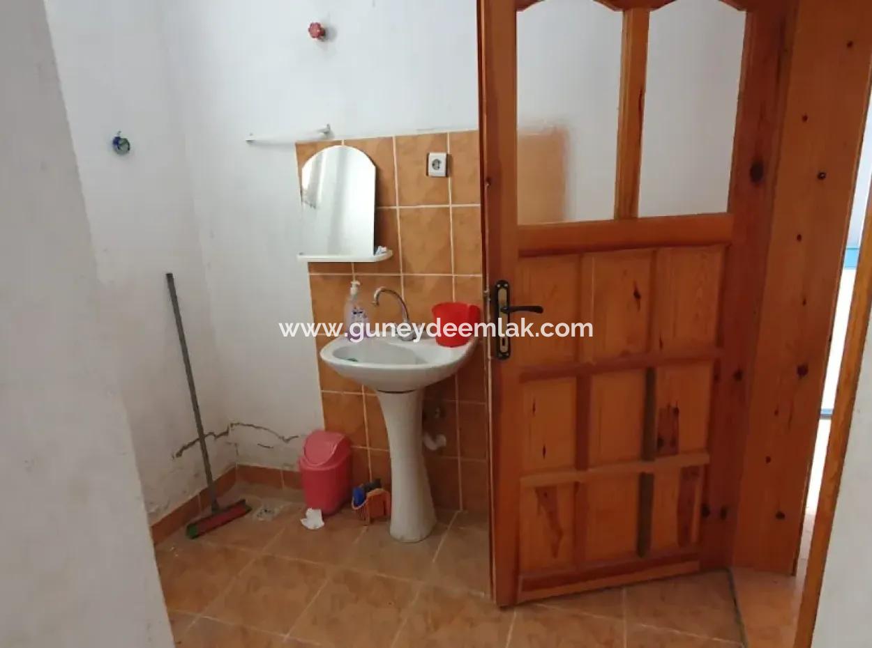 Denizli Çameli Ericekte İçinde 2 Adet Ev Bulunan Arazi Satılık