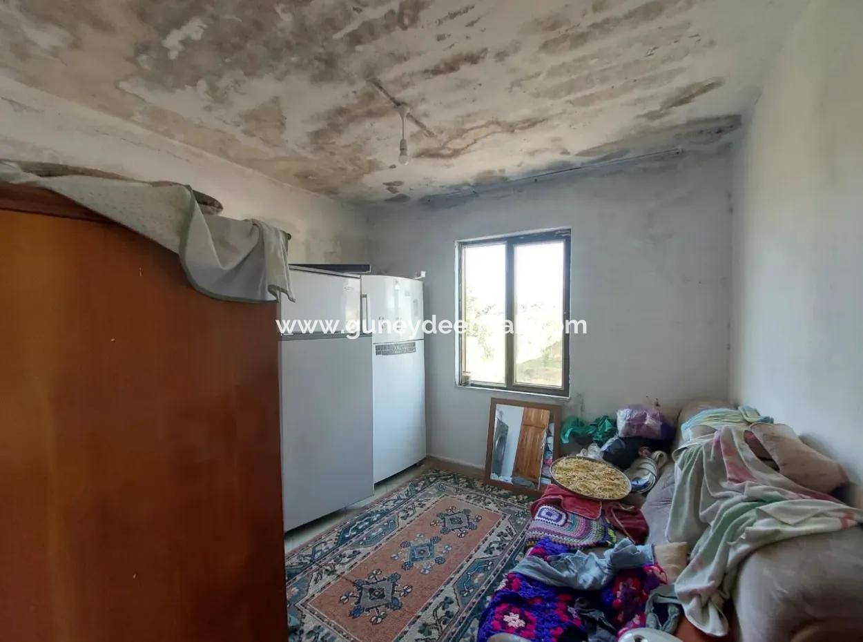 Ortaca Eskiköy’de 5.850 M² Göl Manzaralı Arazi Ve Köy Evi Satılık